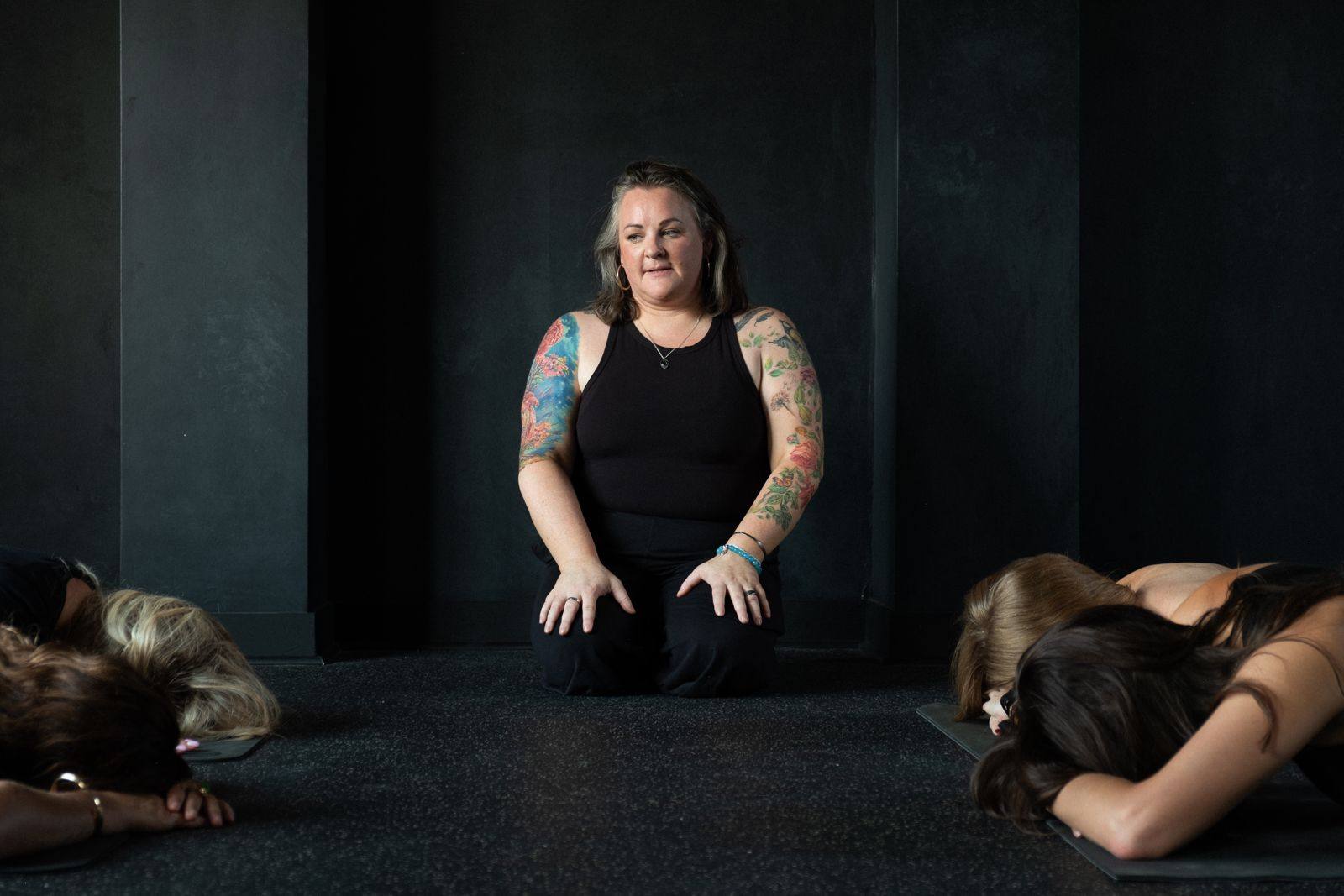 Susan leading a seated class in the studio