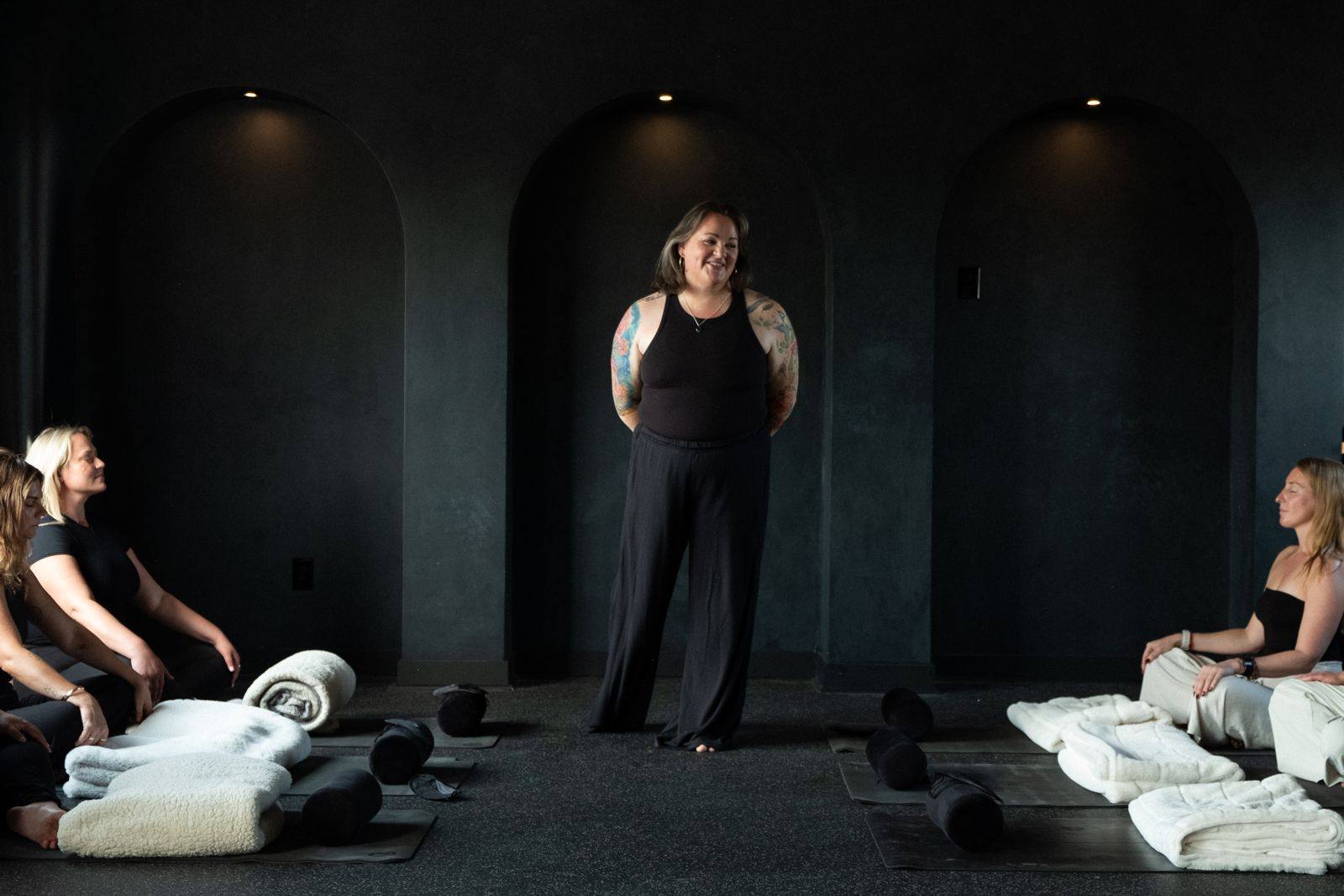 Susan guiding a breathwork class in the State Shift studio