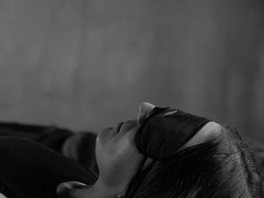 Close up of a member resting in an eye mask