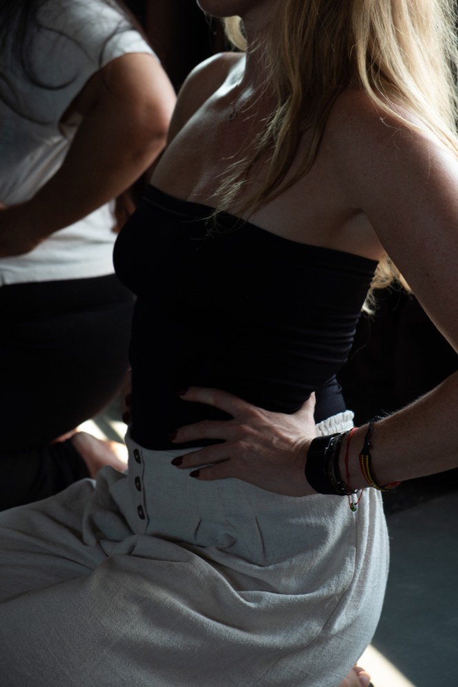 Susan Benoit adjusting a participant's posture during a State Shift facilitator training